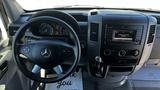 Interior view of a 2016 Mercedes-Benz Sprinter dashboard featuring a steering wheel and control panel with various gauges and technology interfaces