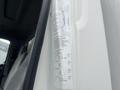 A close-up of a sticker on a 2008 Hino 268 truck door displaying weight and tire pressure specifications