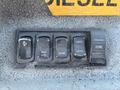 Control panel featuring five buttons labeled SHDN OVRD CRUISE SET/COST DOME on a 2010 Freightliner MT45 Garbage Truck