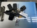 A set of keys for a 2016 Mercedes-Benz Sprinter featuring multiple key fobs and a keychain with a label