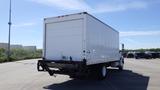 A white 2009 Hino 268 box truck with a closed cargo area and visible tailgate parked in a lot