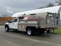 A 2018 Ford F-550 fuel truck with a silver refueling tank marked with Petro-Canada branding and safety labels