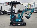 A 2024 AGT Mini Excavator with a turquoise body, tracks, a raised operator's seat, and an attachment arm positioned at an angle