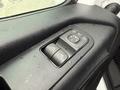 Close-up of the window control panel on a 2019 Mercedes-Benz Sprinter featuring buttons for adjusting windows and a round control dial