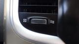 Control panel with a dial and button for airflow adjustment in a 2014 RAM 5500