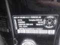 A 2016 Porsche Boxster with a manufacturer's label displaying details like compliance information and weight specifications