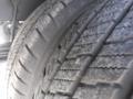 Image of a close-up view of a tire from a 2016 Ford Transit showcasing its tread pattern and rubber surface