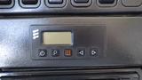 Dashboard control panel of a 2014 International 3000 featuring buttons for settings and a digital display