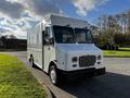 A white 2017 Freightliner M Line delivery truck is parked with a boxy design and large front windows