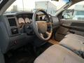 Interior view of a 2008 Dodge Ram 5500 showcasing a steering wheel and dashboard with gauges and controls