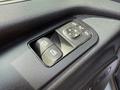Control panel with buttons for adjusting windows and locks in a 2019 Mercedes-Benz Sprinter