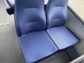 A pair of blue textured seats from a 2017 Chevrolet Express van