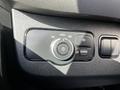 Close-up of the control panel for headlights in a 2021 Mercedes-Benz Sprinter featuring a dial and buttons for light settings