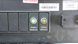 A control panel with two buttons labeled Hybrid Enabled and Hybrid Service alongside indicator lights for a 2011 Ford Econoline