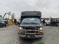 A 2017 Chevrolet Express with a black front and chrome grille featuring a guard bar and visible headlights