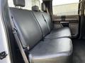 2017 Ford F-150 interior featuring a rear bench seat with black leather upholstery and safety belts