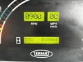 Display panel of a 2007 Tennant Sentinel showing digital readouts for RPM, speed in miles per hour, and other metrics including hours and mileage