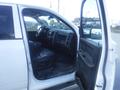 The interior of a 2019 RAM 1500 Classic Eco Diesel showing the driver's seat, dashboard, and open door