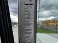 A label displaying specifications for a 2014 Kenworth T370 truck including model number and various technical details