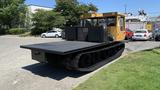 2015 PowerBully Tracked Flat Deck Equipment Carrier with large flat deck and tracks for mobility designed for transporting equipment