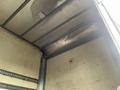 Interior view of a 2008 Hino 268 truck showing the ceiling with a metallic finish and a safety sign visible on the wall