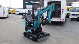 2023 FF 13 Mini Excavator with a teal and black design featuring a front bucket and rubber tracks