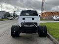 A 2008 Dodge Ram 5500 truck with an unfinished rear end and large tires visible from the back