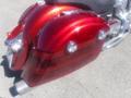 A 2017 Indian Chieftain Elite motorcycle with a glossy red finish featuring chrome accents and a distinctive rear fender design