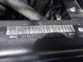 Close-up of a metal ID tag displaying the serial number 5B4KPD2U473426770 on a 2007 Morgan Olson Workhorse W42 vehicle