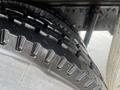 Close-up of a treaded tire from a 2008 Hino 268 showing detailed texture and traction design