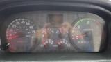 Dashboard of a 2009 Hino 338 Garbage Truck showing speedometer fuel gauge and RPM meter