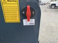 A control panel on a 2024 AGT Mini Excavator featuring a red switch labeled ON and OFF along with a warning sign for power supply instructions