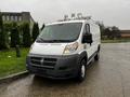 A white 2018 RAM Promaster van with a gray front bumper and roof-mounted equipment