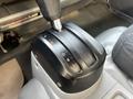 The gear shift of a 2020 Hino 195 showing the positions for park reverse drive and low gears
