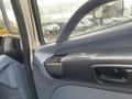 Interior view of a 2008 Hino 268 showing the door panel with a handle and controls