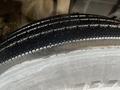 Close-up of a tire from a 2008 Hino 268 showing tread patterns and surface texture