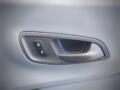 Interior door handle with power lock buttons of a 2015 Ford Transit