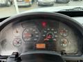 Dashboard of a 2007 International 4200 displaying various gauges for speed RPM fuel and other indicators
