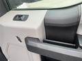 Interior door handle and control panel of a 2017 Ford F-150