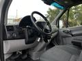 Interior view of a 2016 Mercedes-Benz Sprinter showing the dashboard steering wheel and driver seat