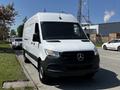 2022 Mercedes-Benz Sprinter van in white with a black grille and Mercedes logo on the front