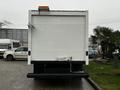 A 2017 Ford Econoline box truck is shown from the rear with a white exterior and a safety light on top