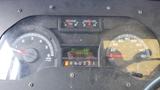 Dashboard of a 2011 Ford Econoline displaying speedometer tachometer fuel gauge and odometer reading 159433 miles