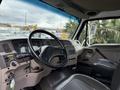 Interior view of a 2008 Sterling Acterra truck featuring the steering wheel dashboard and driver's seat