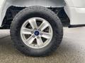 Close-up of a 2017 Ford F-150 wheel featuring a silver alloy rim and a Toyo Open Country tire