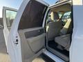 A 2013 Ford Expedition with open doors showing the spacious interior and seating arrangement
