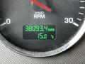 Displays the hour meter and temperature gauge of a 2014 Kenworth T370 showing 38093.4 hours and 15.0 degrees Celsius