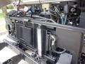 Close-up of the engine compartment of a 2007 Morgan Olson Workhorse W42 showing various mechanical components and tubing