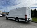 A white 2016 Mercedes-Benz Sprinter van parked on a concrete surface with a plain exterior and no visible markings or logos