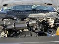 2019 Ford F-350 Super Duty engine compartment featuring various engine components and hoses in a clean and organized layout